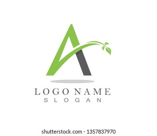 A letter logo with green leaf