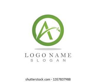 A letter logo with green leaf