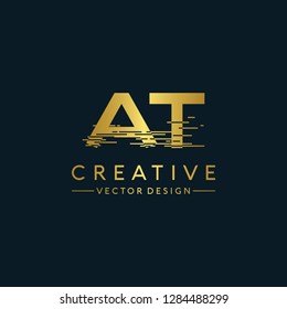 Letter AT Logo Initial. Gold Letter Design Vector Golden Luxury Colors