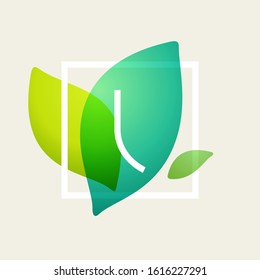 Letter I logo in square frame at green leaves watercolor background. Vector ecology typeface for botanical labels, floral headlines, recycle posters, organic cards etc.