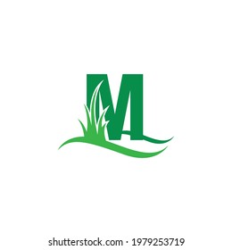 Letter M behind a green grass icon logo design vector template