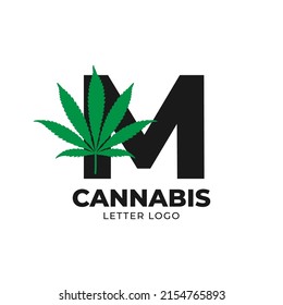 letra M con elemento de diseño del logotipo del vector de hoja de cannabis