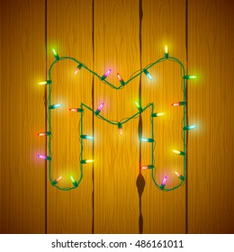 Letter M Colorful Glowing Christmas Lights. Vector illustration