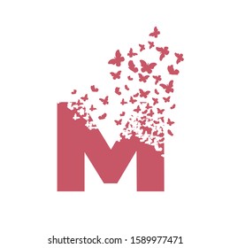 The letter M dispersing into a cloud of butterflies and moths.