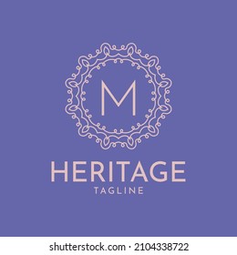 letter M feminine circle frame luxury vector logo design