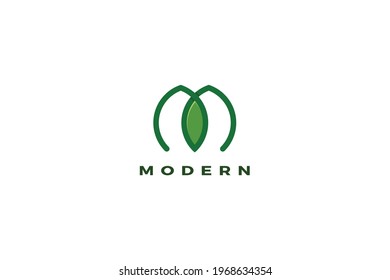 Letter M green leaf business logo   