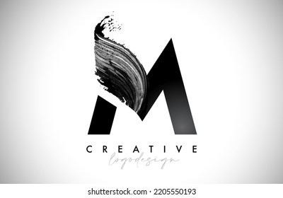 Letter M Logo Brush Stroke with Artistic Watercolor Paint Brush Icon Vector Design. Modern Elegant Minimalist Stroke Letter M Shape Symbol with Paint Style Swoosh. 