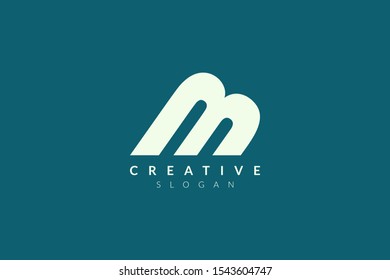 The letter M logo design extends to the side. Minimalist and modern vector illustration design suitable for business or brand.