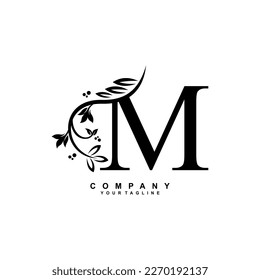 letter M logo design with flowers, leaves and black feathers in a beautiful and elegant style. monogram M. typography M. initial M logo. suitable for, business, wedding, boutique, company, hotel, etc