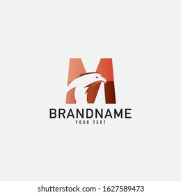 Letter M logo and eagle design combination