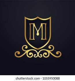 Letter M logo vector. Design Elegant with Gold Shield and Ornament.