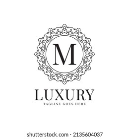 letter M luxury circle minimalist lace decoration vector logo design