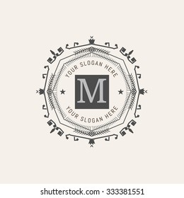 The letter M made in modern line style vector. Luxury elegant frame ornament and ethnic tribal elements. Example designs for Cafe, Hotel, Jewelry, Fashion, Restaurant 