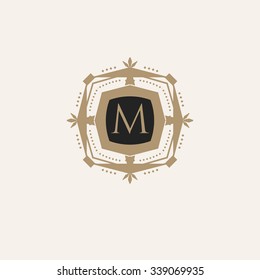The letter M made in modern line style vector. Luxury elegant frame ornament and ethnic tribal elements. Example designs for Cafe, Hotel, Jewelry, Fashion, Restaurant 