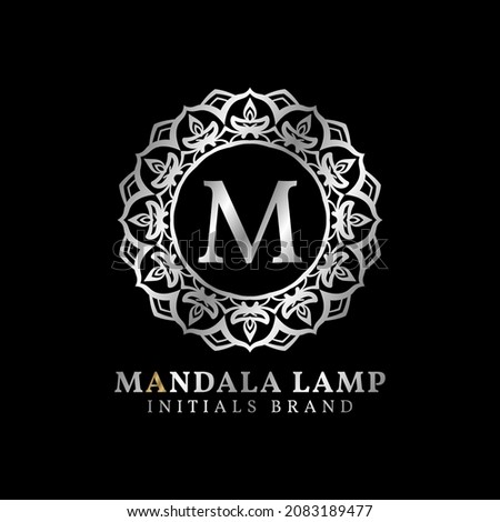 letter M mandala lamp initials decorative vector logo design for wedding, spa, hotel, beauty care