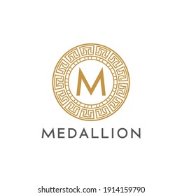 Letter M medallion with ancient greek circle monogram logo design