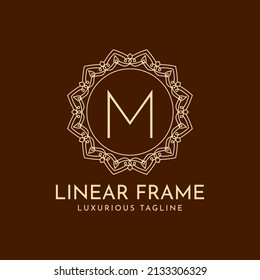 letra M marco de círculo minimalista decoración lujosa lineal diseño de logotipo vectorial