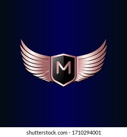 letter M shield with wings gold color logo design concept template vector 3d heraldic shield and wings logo gold / silver emblem