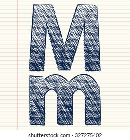 letter M sketch in a notebook