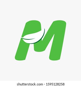 Letter M with white Leaf Vector