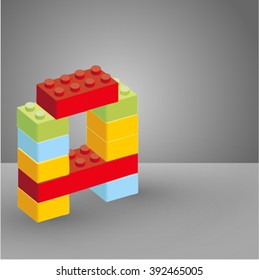 the letter A made of plastic parts