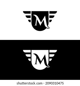 marca de letra M logotipo monograma con escudo y alas