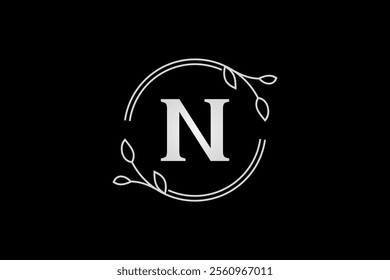 letter n with circle branches and leaves frame elegant luxury logo