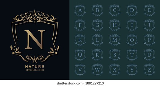 Letter N or collection initial alphabet with luxury ornament floral frame golden logo template.