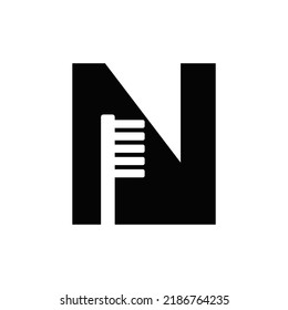 Letter N Dental Logo Concept with Tooth Brush Vector Template. Teeth, Dental Care Symbol, Medical and Medicine Sign
