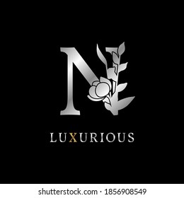 letter N flower leaves decoration for wedding, beauty care logo, personal branding identity, make up artist or any other royal brand and company. luxurious gold and silver color sample in dummy text