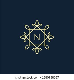 Letter N with a flower/leaf frame for an inspiring logo design