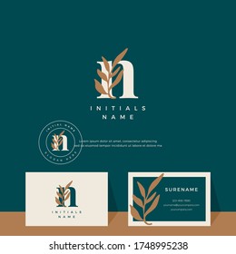 letter N with leaf Beauty vector logo design of initial wedding, fashion, boutique, floral and botanical logotype with business card template