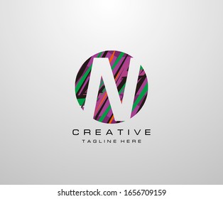 Letter N Logo. Abstract Circle N letter design, made of various geometric shapes in color.