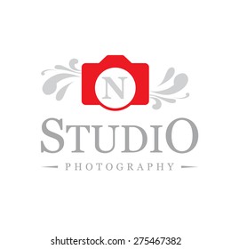 Letter N logo , creative red camera symbol floral , Elegant calligraphic ornament line art monogram logo design for photographer , Fashion & wedding photography logo design . vector illustration