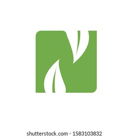 letter N logo design with leaf