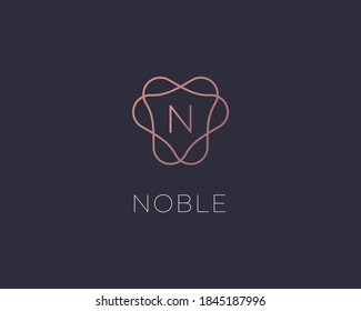 Monograma del logotipo de la letra N, marca inicial del logotipo de identidad de estilo mínimo. Líneas de gradiente dorado emblema vectorial lotipo para hotel boutique spa.