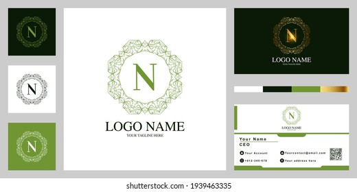 Letter N luxury ornament flower or mandala frame logo template design with business card.