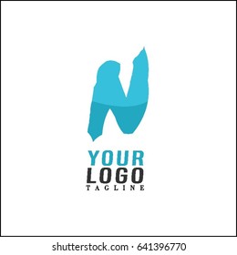 Letter N paint brush stroke vector design. Hand lettering logo.