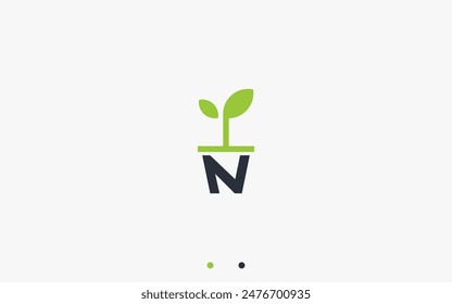 letra n con ilustración de silueta de Vector de diseño de logotipo de maceta de planta