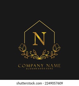 letter N Real estate logo concept. Feminine style Handwritten alphabet with floral in the logo template. Letters and Alphabet for your logo design.