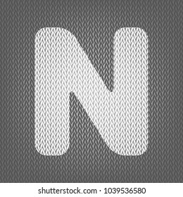 Letter N sign design template element. Vector. White knitted icon on gray knitted background. Isolated.