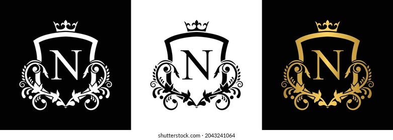 Letter N template logo shield letter with crown. alphabet . Beautiful royal initials letter.
