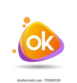 Letter OK logo in triangle splash and colorful background.