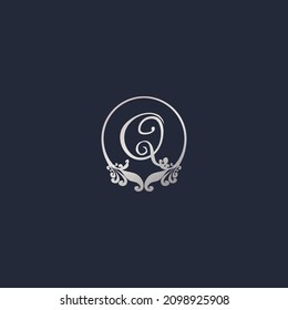 Letter Q Decorative Crown Ring Alphabet Logo isolated on Navy Blue Background. Luxury Silver Initial Logo Design Template. Elegant Curl Floral Logo Concept. EPS 10 File Project