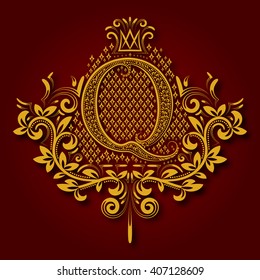 Letter Q heraldic monogram in coats of arms form. Vintage golden logo with shadow on maroon background. Letter Q is surrounded by floral elements of design.