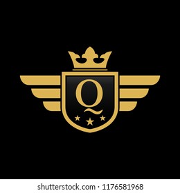 Letter Q initial wing with shield and crown, Luxury logo design vector 
