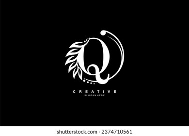 letter Q logo with circular ornaments of leaves, flowers and feathers. monogram typography letter Q. flourish logo. suitable for business, company, beauty, boutique, brand, nature, etc