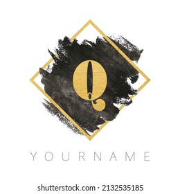 Letter Q logo design. Black watercolor brush stroke with gold letter and gold square frame.