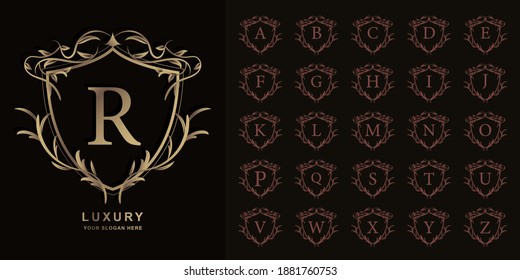 Letter R or collection initial alphabet with luxury ornament floral frame golden logo template.