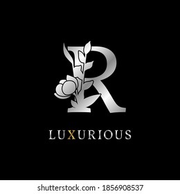 letter R flower leaves decoration for wedding, beauty care logo, personal branding identity, make up artist or any other royal brand and company. luxurious gold and silver color sample in dummy text